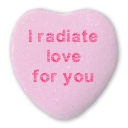 I radiate love for you on a pink candy heart